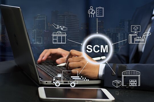 businessman analyse supply chain management ( SCM )